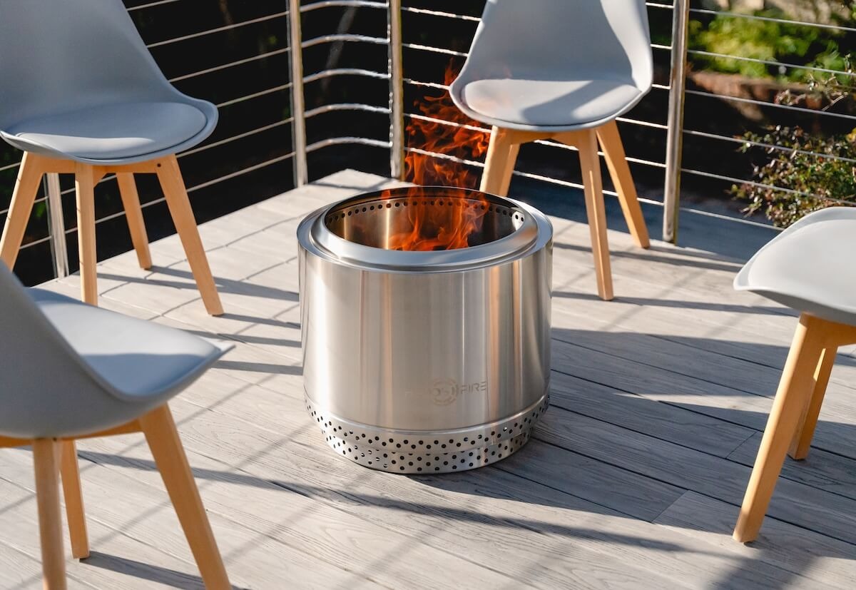 Helios Fire pit owner enjoying smoke-free flames under a South African night sky