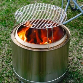 Protective fire pit cover and accessories on a composite deck